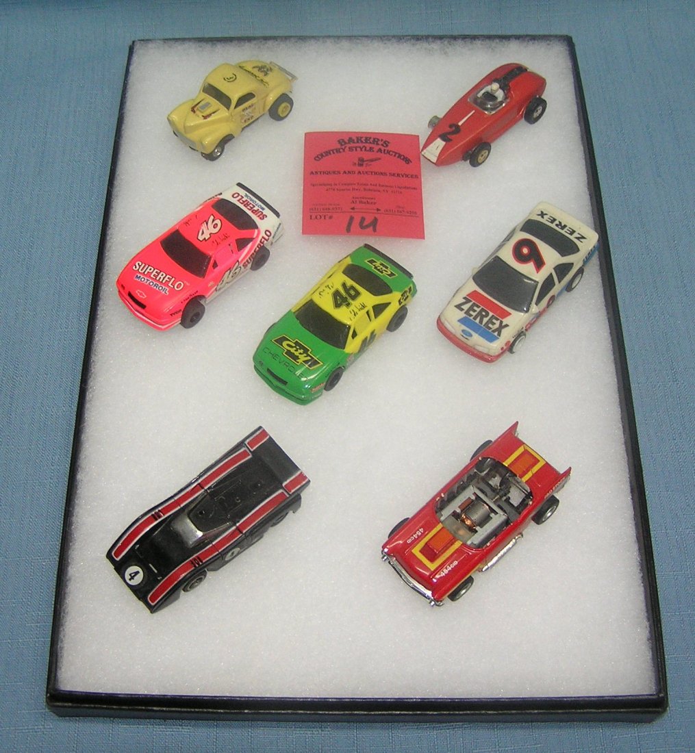Collection of vintage slot cars: Collection of vintage slot cars includes Aurora, Tyco and more est. value $100.00-$125.00