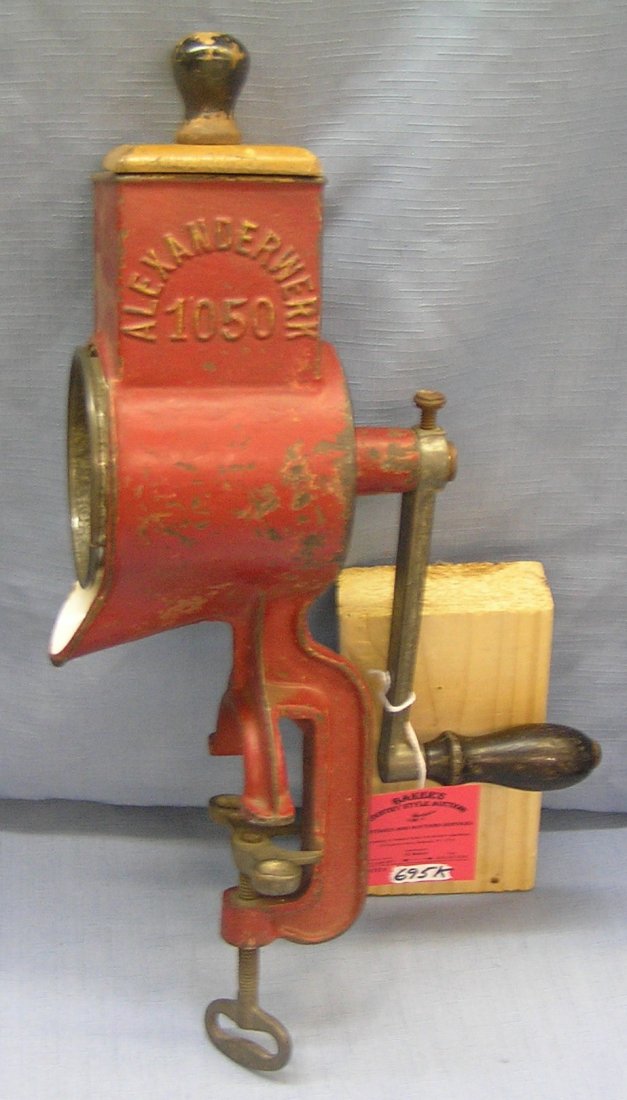 Antique food grinder by Alexsanderwerk: Antique food grinder by Alexsanderwerk circa early 1900's all cast iron with enamel est. value $150.00-$200.00