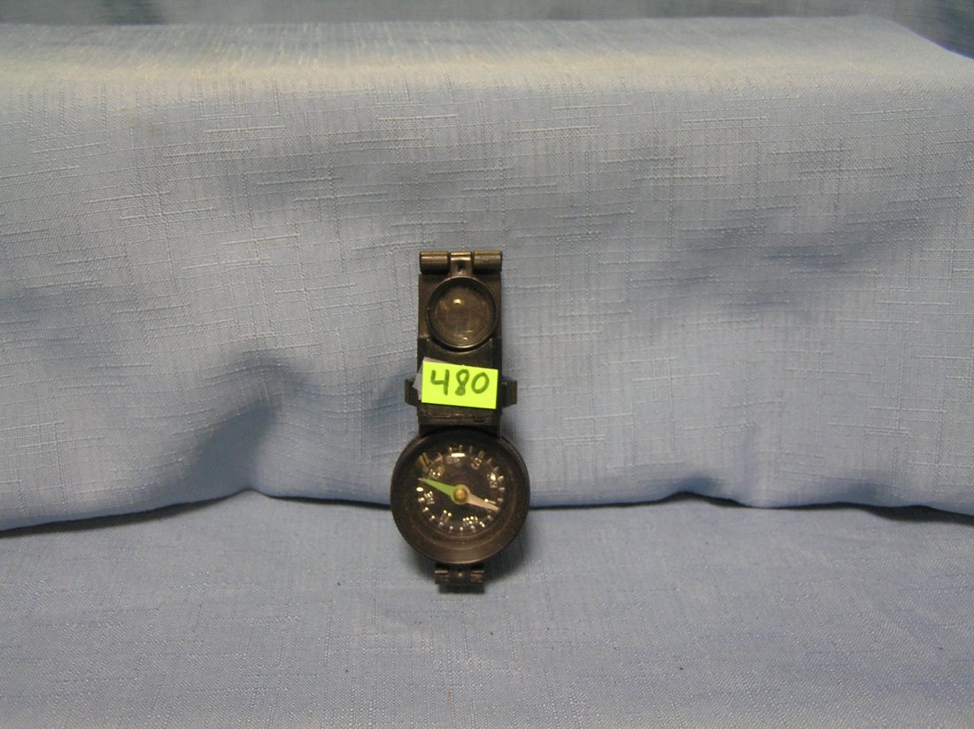 Modern compass and magnifier: Modern compass and magnifier est. value $15.00-$25.00