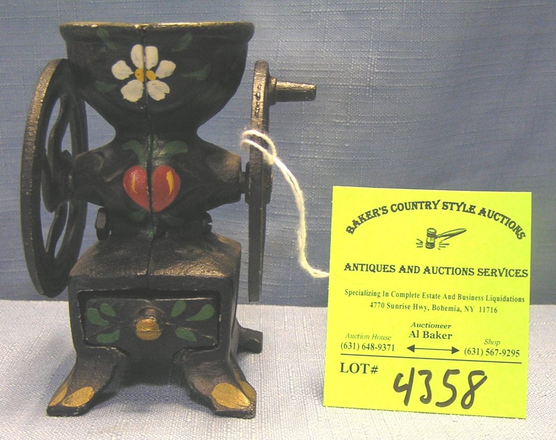 Hand painted miniature cast iron coffee mill: Hand painted miniature cast iron coffee mill $35.00-$40.00