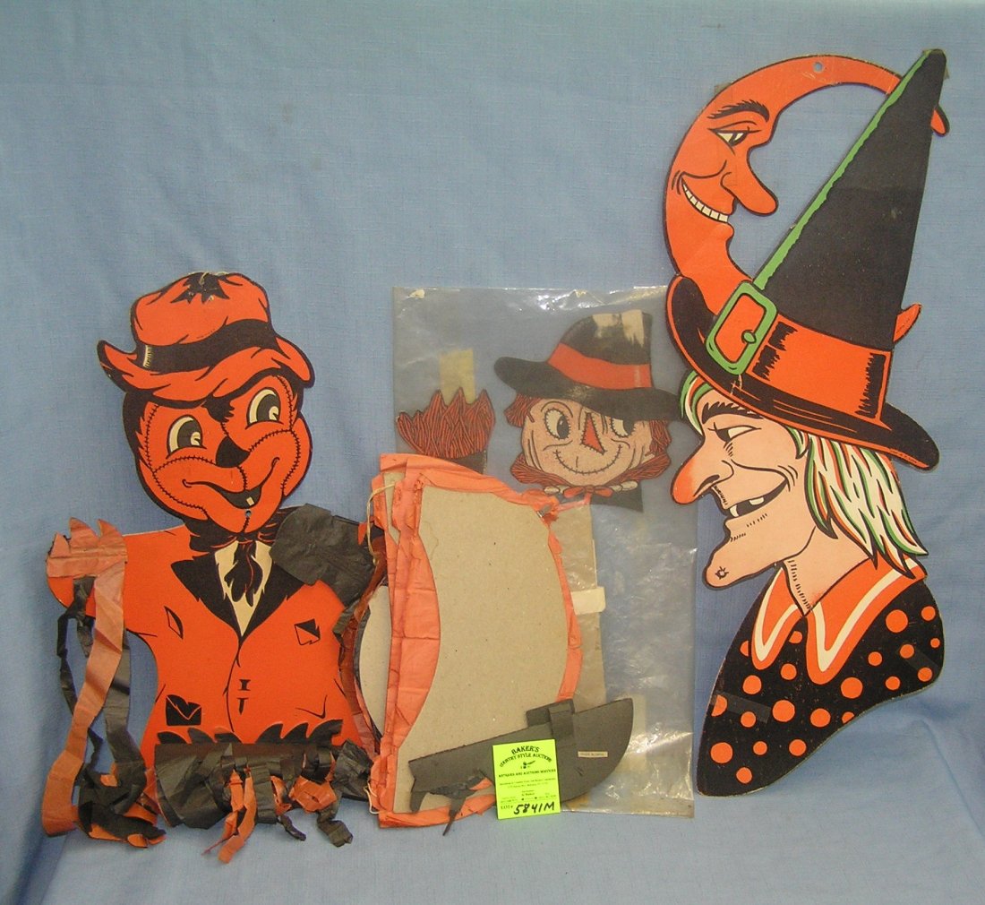 Group of larger scale die cut Halloween decorations: Group of larger scale die cut Halloween decorations includes witch, scary cat, scarecrow, cat, pumpkin and spider est. value $75.00-$100.00