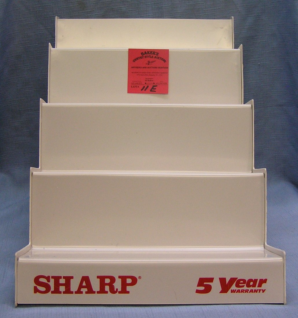Sharp wrist watch advertising store display stand: Sharp wrist watch advertising 4 tier store display stand, mint old store stock, never distributed or used est. value $50.00-$75.00