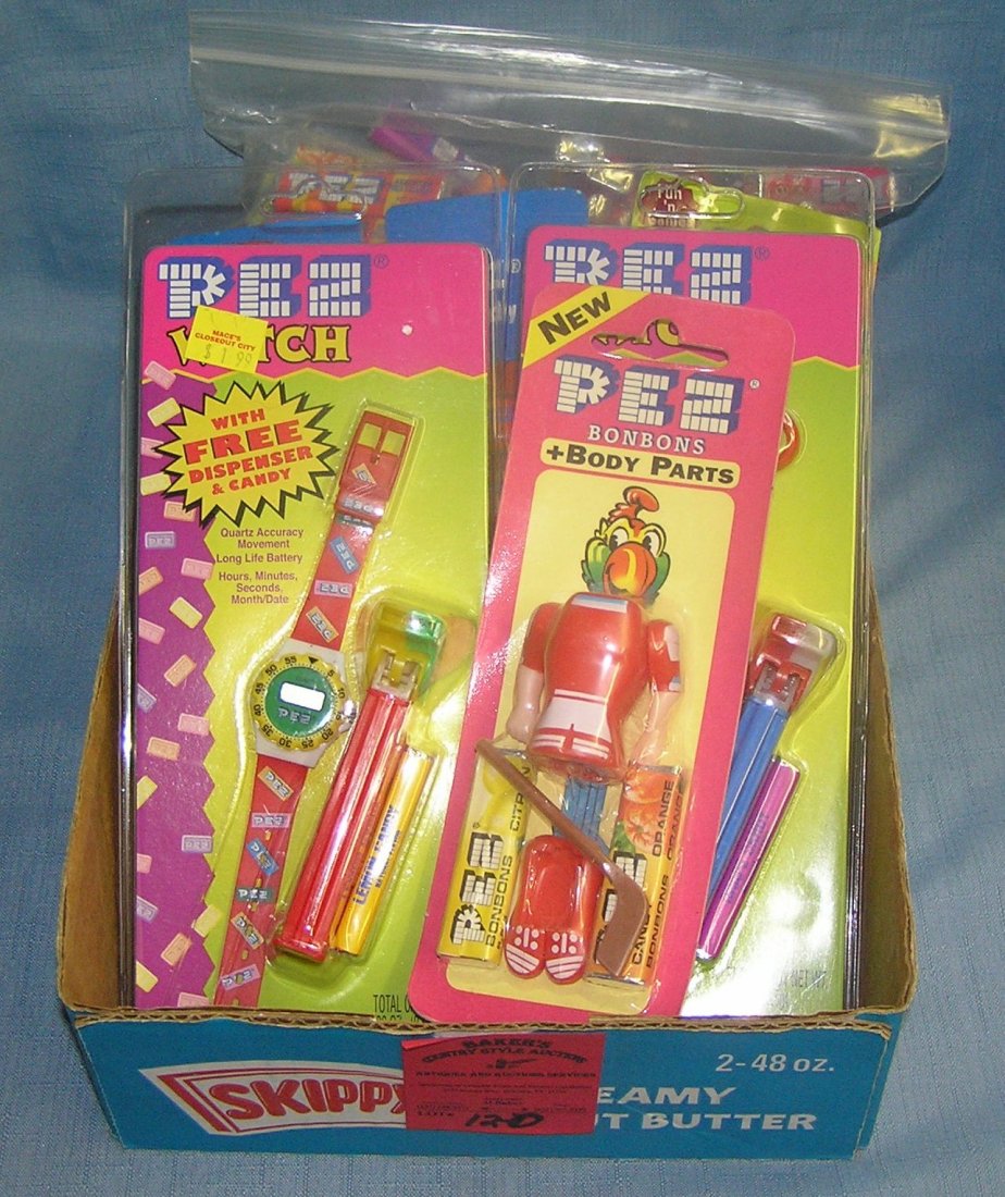 Box full of vintage PEZ candy containers: Box full of vintage PEZ candy containers all with original packages est. value $50.00-$75.00
