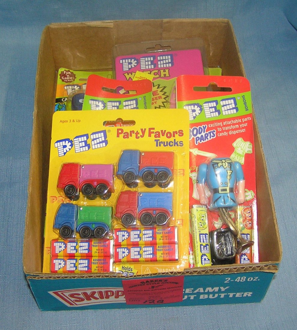 Box full of vintage PEZ candy containers: Box full of vintage PEZ candy containers all with original packages est. value $50.00-$75.00