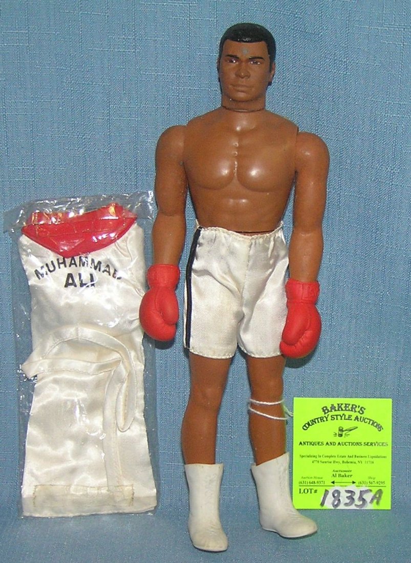 Muhammad Ali sports figure by Mego toys: Vintage Muhammad Ali sports figure by Mego toys with original robe, still mint in package est. value $200.00-$250.00