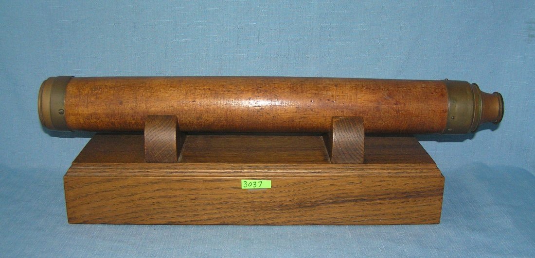 Antique wood and brass telescope: Antique wood and brass telescope on custom made stand est. value $225.00-$250.00