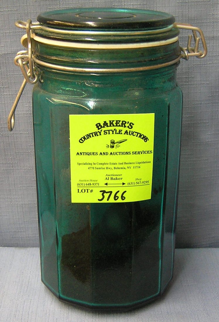 Vintage green glass storage jar: Vintage green glass storage jar est. value $15.00-$20.00