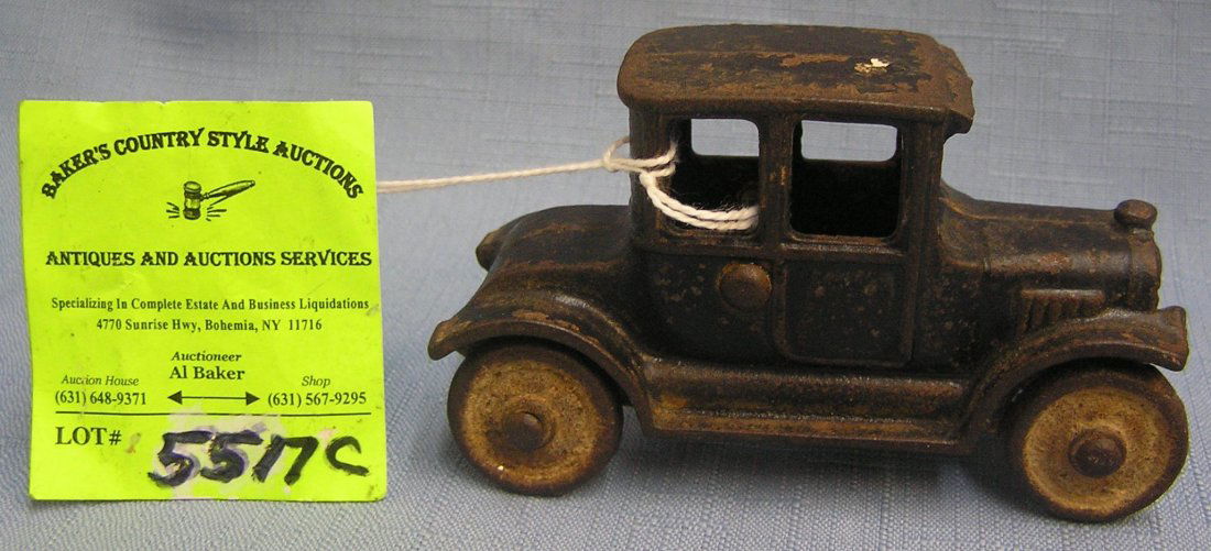 Early Arcade cast iron Model T Ford toy car: Early Arcade cast iron Model T Ford toy car est. value $150.00-$200.00