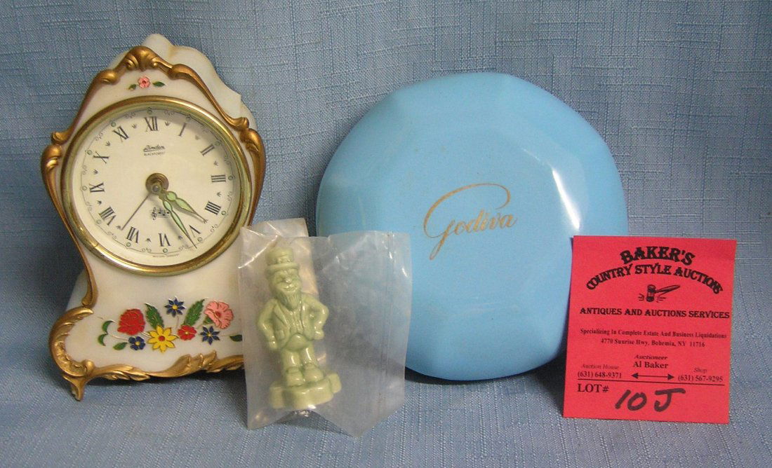 Group of 3 vintage collectibles: Group of 3 vintage collectibles includes Godiva porcelain powder jar, Linden Black Forest vanity clock made in Germany, English Wade figurine est. value $50.00-$75.00