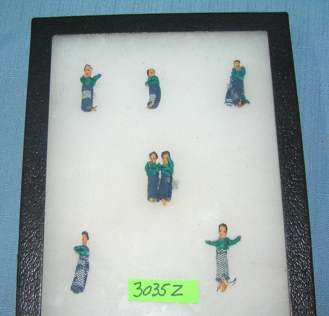 Group of hand stitched miniature dolls: Group of hand stitched miniature dolls may be used for jewelry or for decorative purposeses est. value $35.00-$40.00