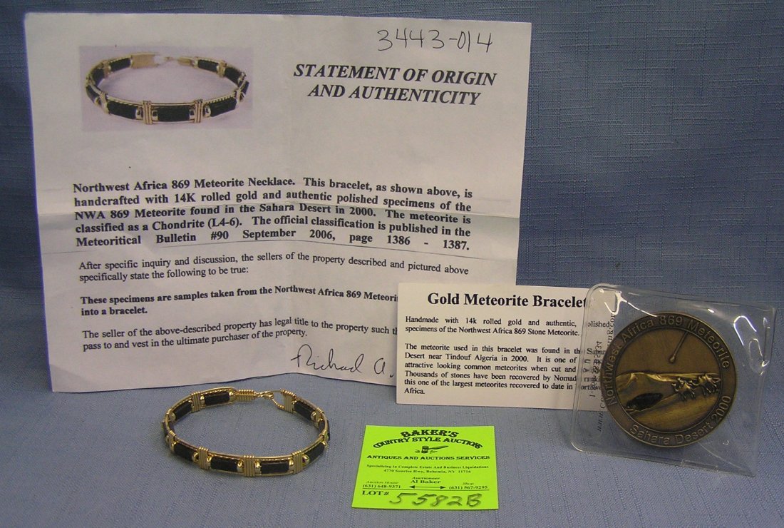 Gold Meteorite bracelet and NW Africa meteorite: Gold Meteorite bracelet and NW Africa meteorite medallion $500.00-$525.00