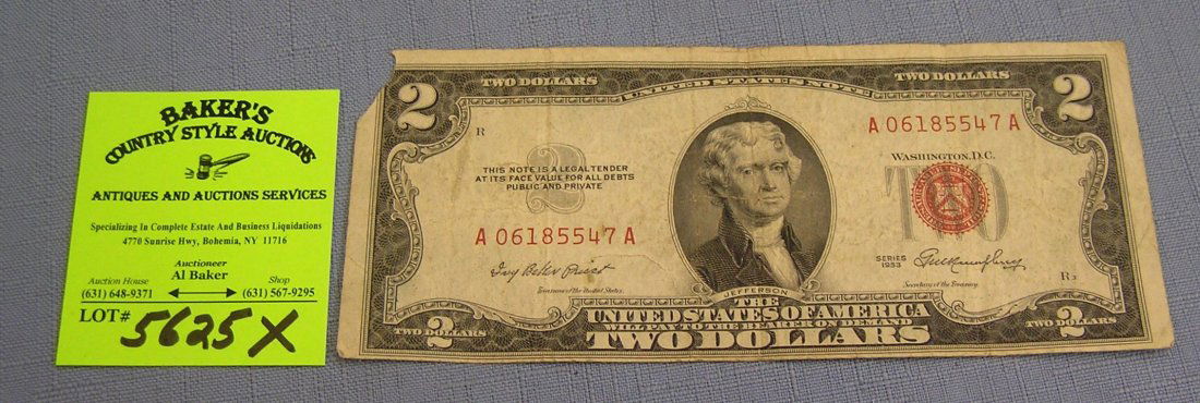 Vintage 1953 two dollar red seal U.S. bill: Vintage 1953 two dollar red seal U.S. bill left upper corner as found $25.00-$30.00