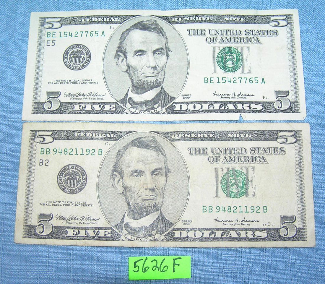Pair of old style US five dollar bills: Pair of old style pre colorization US five dollar bills est. value $25.00-$30.00