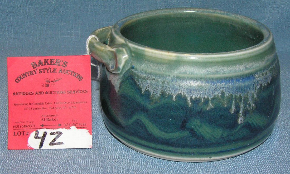 Blue and green decorated earthenware handled bowl: Blue and green decorated earthenware handled bowl est. value $30.00-$40.00