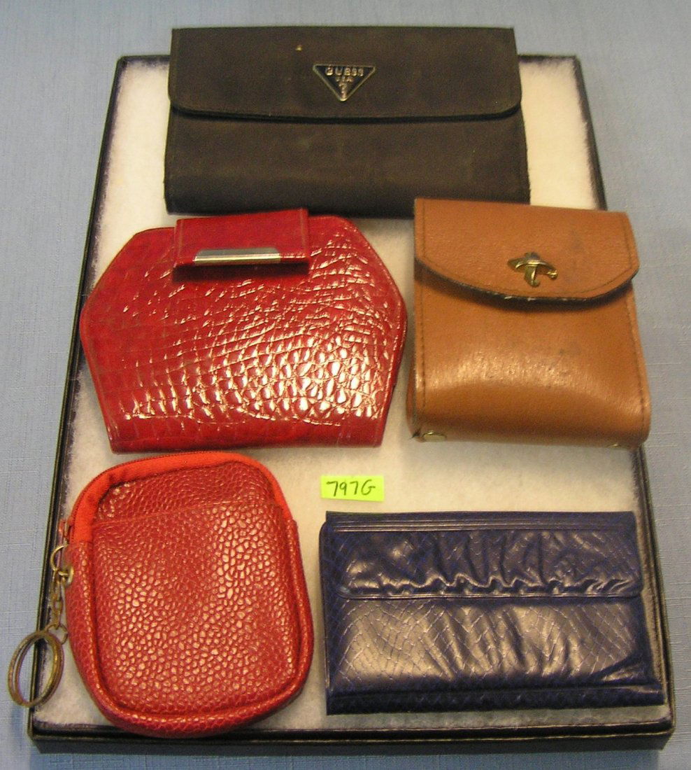 Group of vintage Ladies leather wallets: Group of vintage Ladies leather wallets includes Guess $50.00-$75.00