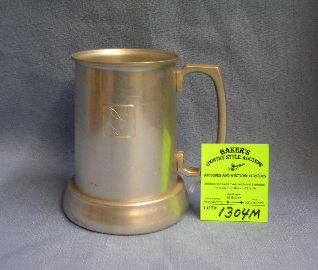 Vintage Playboy aluminum drinking mug: Vintage Playboy aluminum drinking mug with Playboy logos on both sides, all aluminum with glass bottom est. value $30.00-$40.00