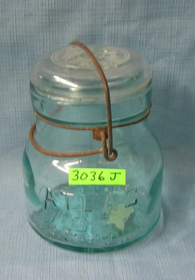 Antique green glass Atlas canning jar: Antique green glass Atlas canning jar est. value $15.00-$20.00