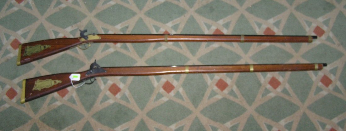 Pair of Revolutionary style flint lock cap guns: Pair of Revolutionary style flint lock cap guns with butt plate stamped Paris/Savannah Tenn. circa 1950's est. value $80.00-$100.00