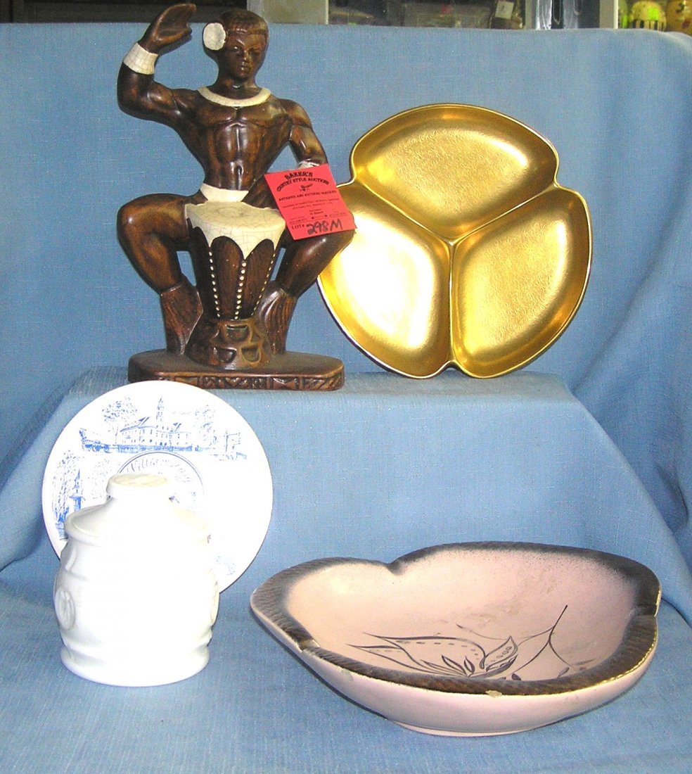 Box full of vintage estate collectibles: Box full of vintage estate collectibles includes African warrior figure , milk glass, sugar bowl, Williamsburg trivet, 2 early serving bowls est. value $75.00-$80.00