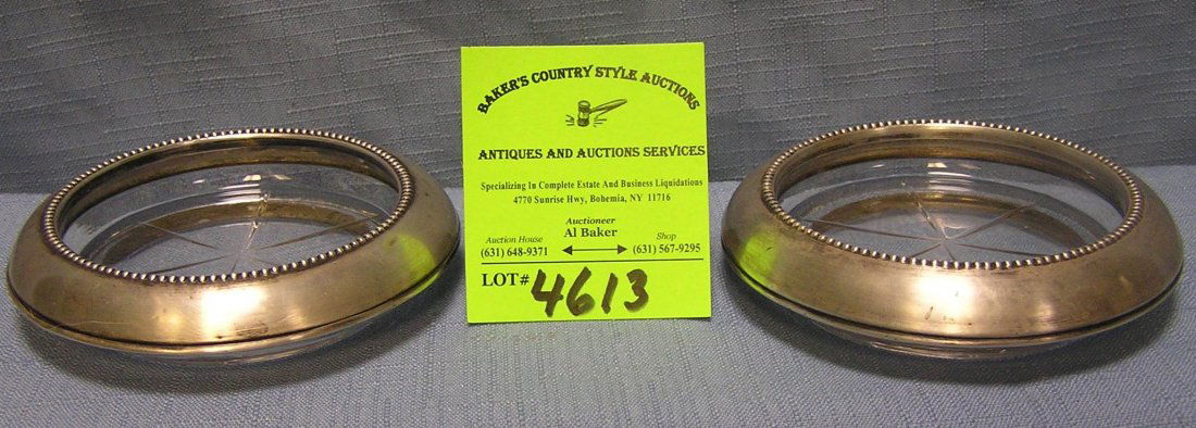 Pair of quality crystal and sterling silver coasters: Pair of quality crystal and sterling silver coasters from the Frank M. Whiting silver company both stamped sterling silver $30.00-$40.00