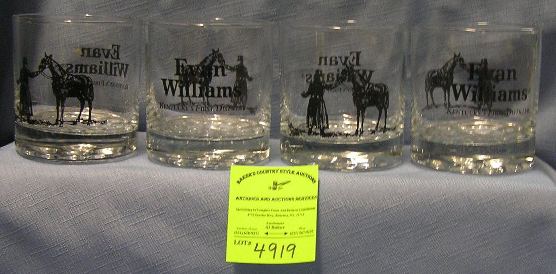 Evan Williams Kentucky Whisky advertising glasses: Group of four Evan Williams Kentucky Whisky advertising glasses $40.00-$60.00