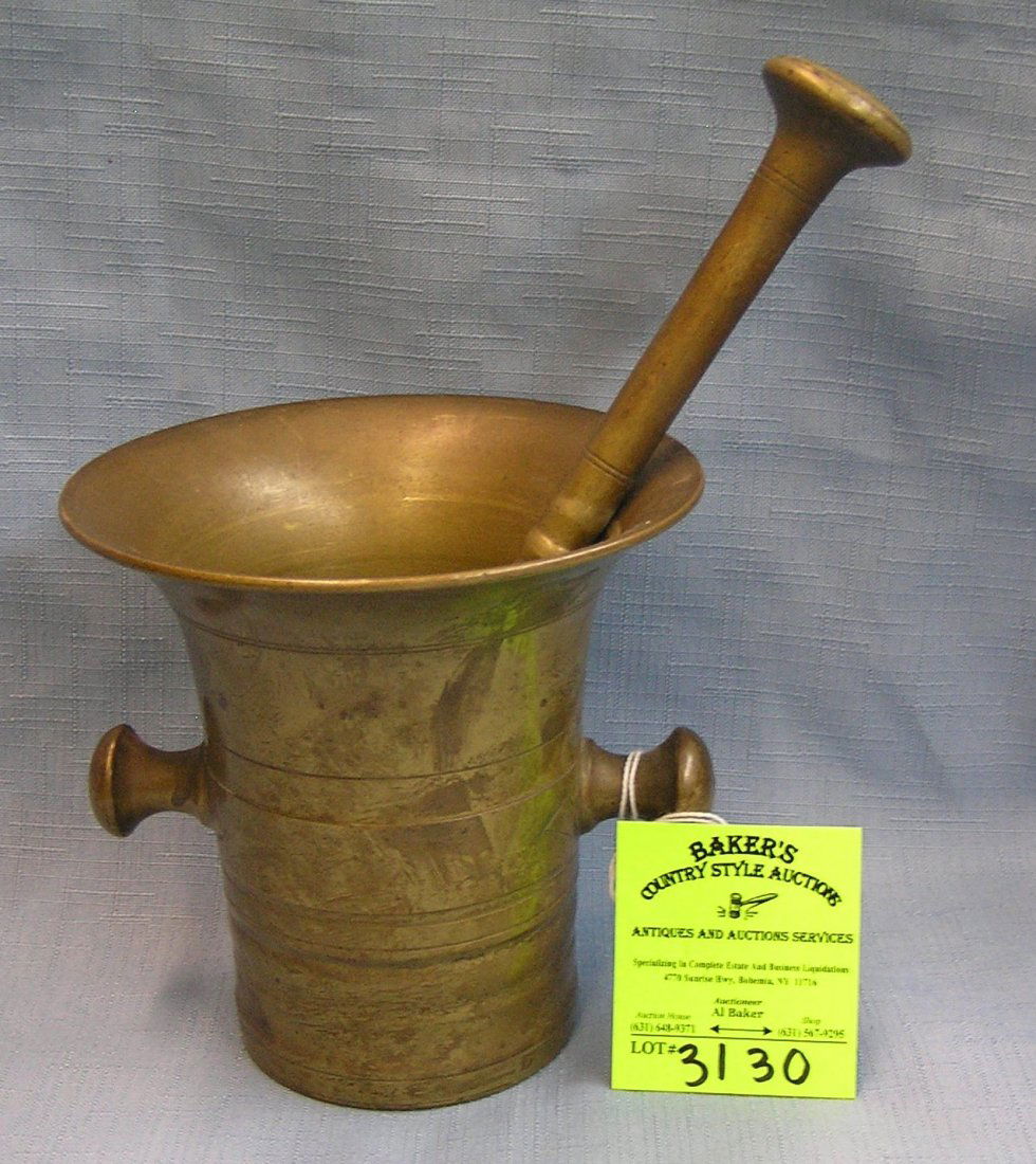 Solid brass antique mortar and pestle: Solid brass antique mortar and pestle est. value $275.00-$300.00