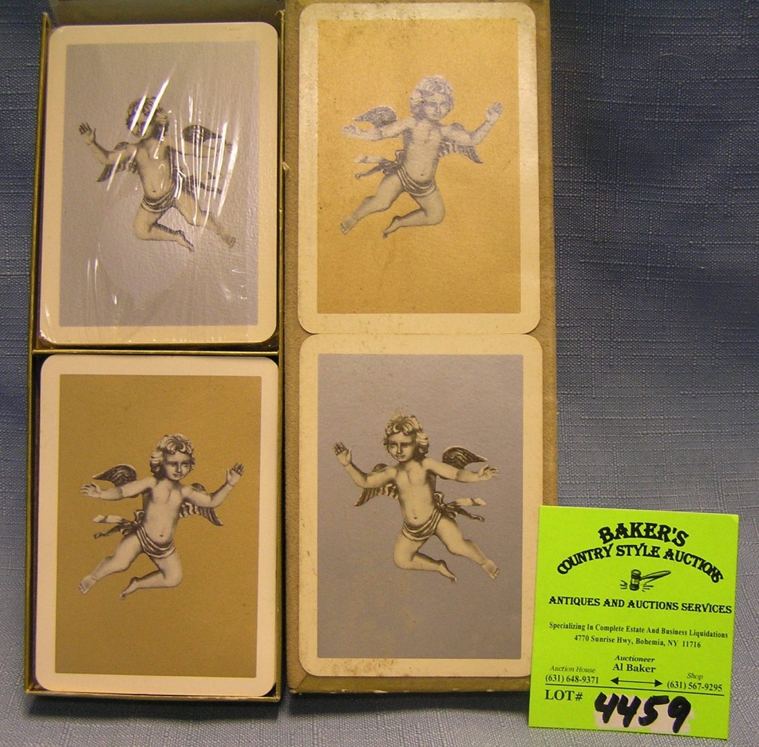 Two decks of early cherub decorated playing cards: Two decks of early cherub decorated playing cards with original box est. value $40.00-$50.00