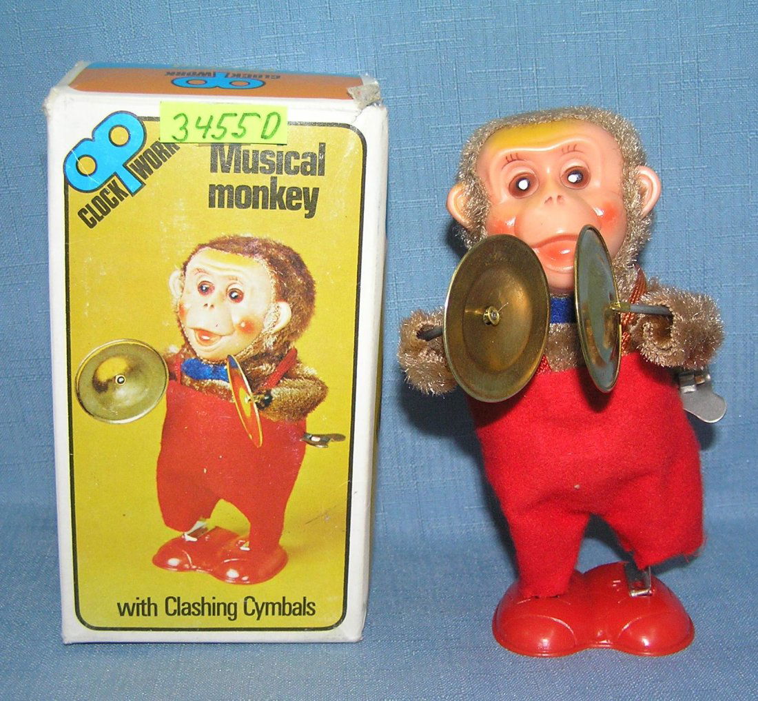 Clock work wind up musical monkey: Clock work wind up musical monkey with original box condition like new but not working est. value $25.00-$30.00