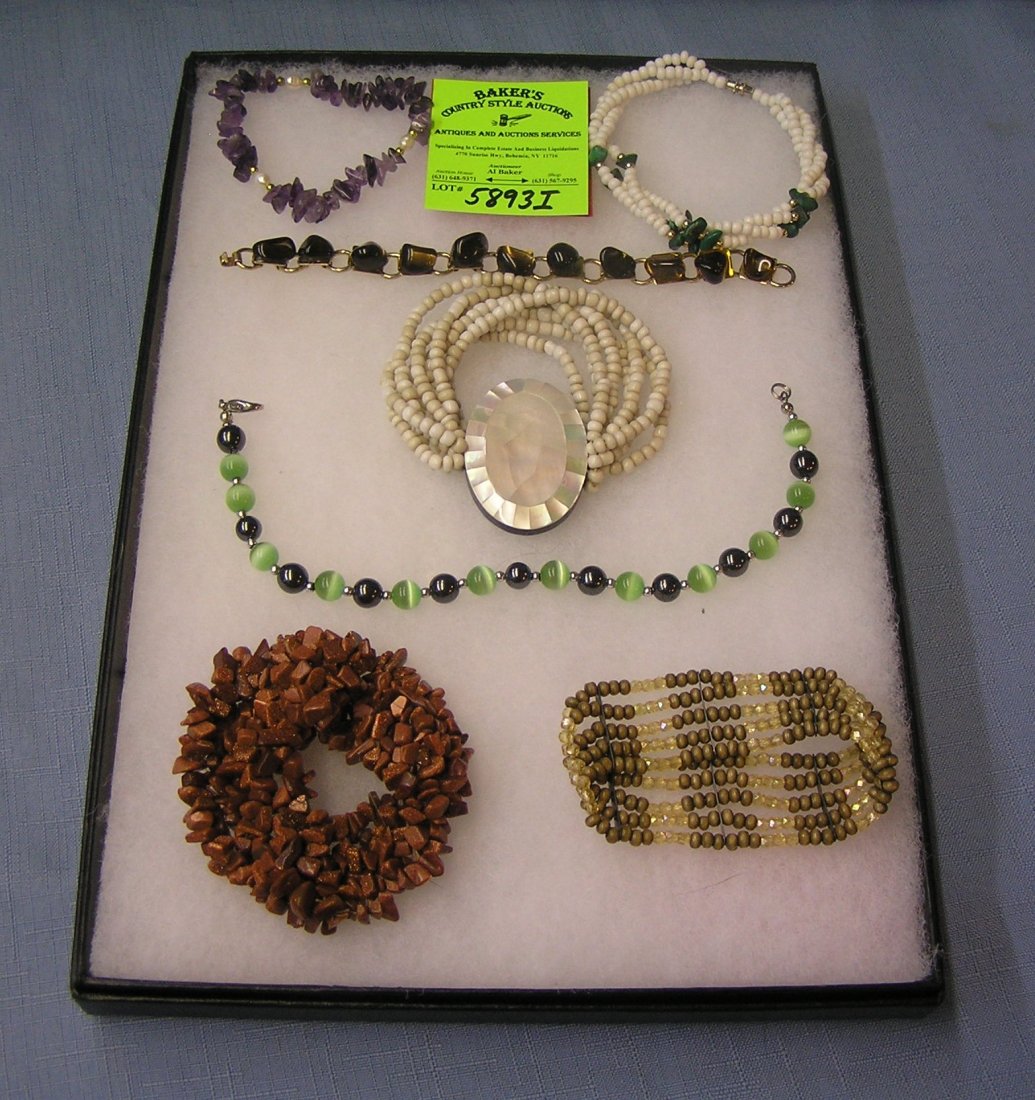 Collection of costume jewelry bracelets: Collection of costume jewelry bracelets including a great early mother of pearl Bakelite and beaded bracelet est. value $100.00-$125.00