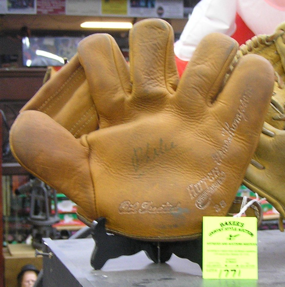 Early Gene Thomson leather baseball glove: Early Gene Thomson leather baseball glove est. value $125.00-$150.00