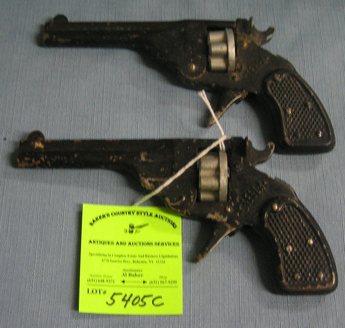 Pair of early Stella all metal cap guns: Pair of early Stella all metal cap guns $75.00-$100.00