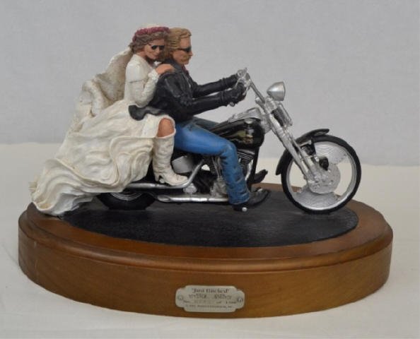 Harley Davidson 'Just Hitched'. No. 243/1500 1995: 1995 Harley Davidson 'Just Hitched'. No. 243/1500. Repaired right arm on man. Measures approx. 13" x 8" x 9.5".