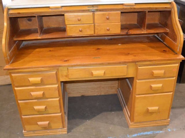 8 Drawer Roll Top Desk 8 Drawer Roll Top Desk with 4: 8 Drawer Roll Top Desk with 4 Small Drawers on inside and measures approx. 55"x25"x44.5"