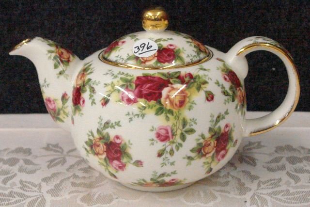 Porcelain Tea Pot by Royal Albert: Porcelain Tea Pot by Royal Albert - Rose decorated 6" tall