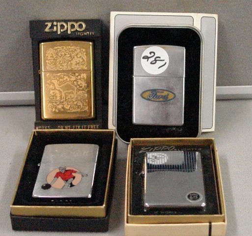 Four Zippo Lighters in original cases: Four Zippo Lighters in original cases