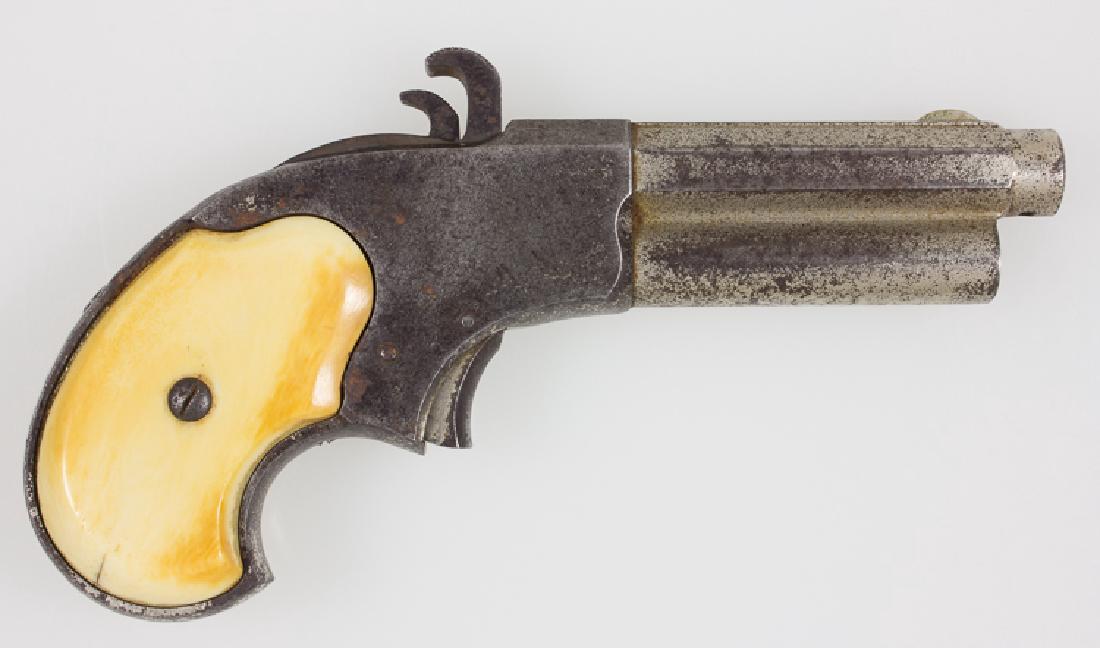 E. REMINGTON & SONS 1871 RIDER MAGAZINE DERRINGER: E. REMINGTON & SONS 1871 RIDER MAGAZINE DERRINGER Rare Remington six-shot Rider magazine derringer, 2 1/2" barrel, 5 3/4" overall, chambered for a specially designed extra-short .30 caliber rimfire ca