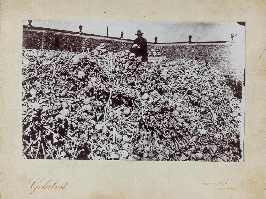 "BONE YARD" AT COLON CEMETARY, HAVANA: "BONE YARD" AT COLON CEMETARY, HAVANA Three photographs (two 6" x 5", one 9 ½" x 7 ½") showing various views of many of the thousands of skulls and other human bones as found by American soldiers at