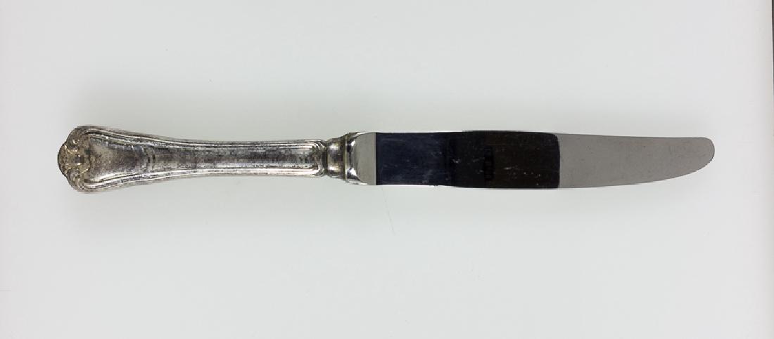 SADDAM HUSSEIN BUTTER KNIFE: SADDAM HUSSEIN BUTTER KNIFE An increasingly difficult item to find, a piece of silverware once belonging to Iraqi dictator Saddam Hussein and taken by a civilian from one of his palaces. The 8" sterli
