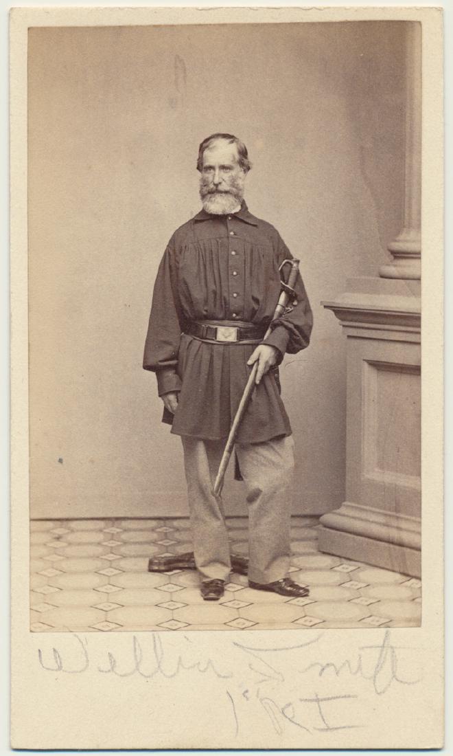 IDENTIFIED 1ST RHODE ISLAND SOLDIER: IDENTIFIED 1ST RHODE ISLAND SOLDIER Carte de visite photograph of an older man with a smock shirt, Union belt and sword identified as Pvt. WILLIAM S. SMITH of the 1st Rhode Island Inf'y, ca. August, 1