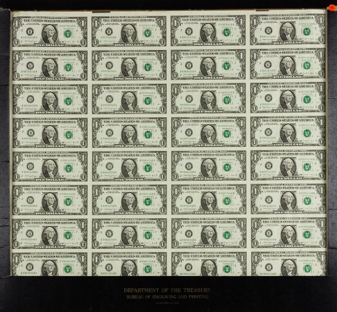 SHEET OF UNCUT DOLLAR BILLS: SHEET OF UNCUT DOLLAR BILLS A sheet of 32 United States dollar bills, series 1988. Mounted in a black cardboard frame, marked: "Department of the Treasury, Bureau of Engraving and Printing". Very good