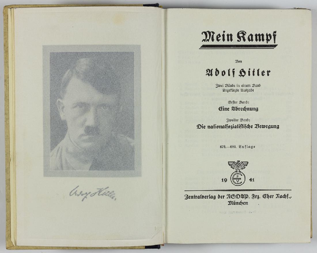 WEDDING" EDITION OF "MEIN KAMPF: "WEDDING" EDITION OF "MEIN KAMPF" Inscribed copy of Adolf Hitler's "Mein Kampf" (Munich: Franz Eher Verlag), 1941. 782pp. 8vo. in cloth boards with leather spine and gilt title, housed in a dark blue