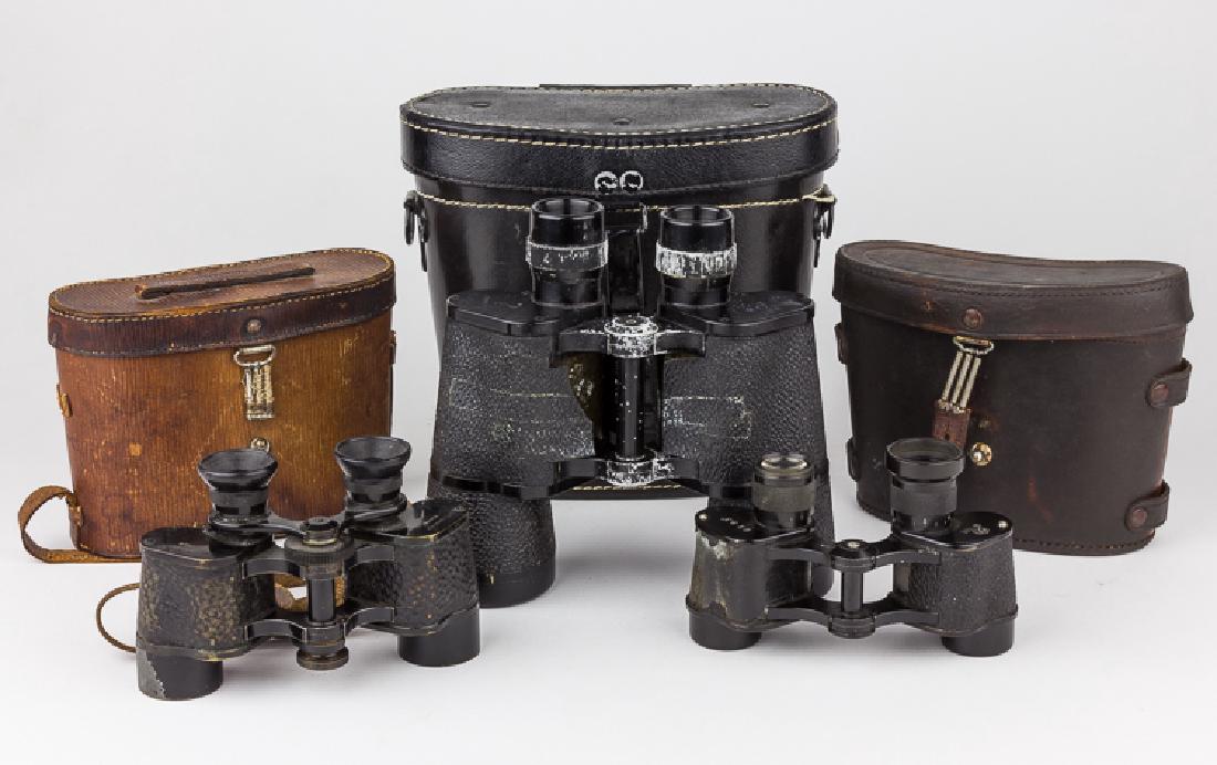 GERMAN AND JAPANESE BINOCULARS (3): Lot of three pairs of binoculars, includes a larger German pair marked "Dienstglas 7x50 beh", eye adjustments seized but could be loosened, cover torn and loose, case marked with "Waffenamt", with str