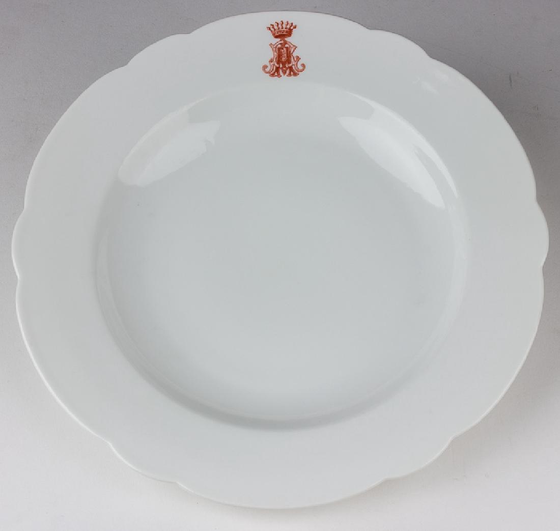 MANFRED VON RICHTOFEN SOUP BOWL: MANFRED VON RICHTOFEN SOUP BOWL White porcelain scallop-edged soup bowl, approx. 9 3/4" dia., bearing the personal monogram of MANFRED VON RICHTHOFEN (1892-1918), a red stylized letter "M" superposed