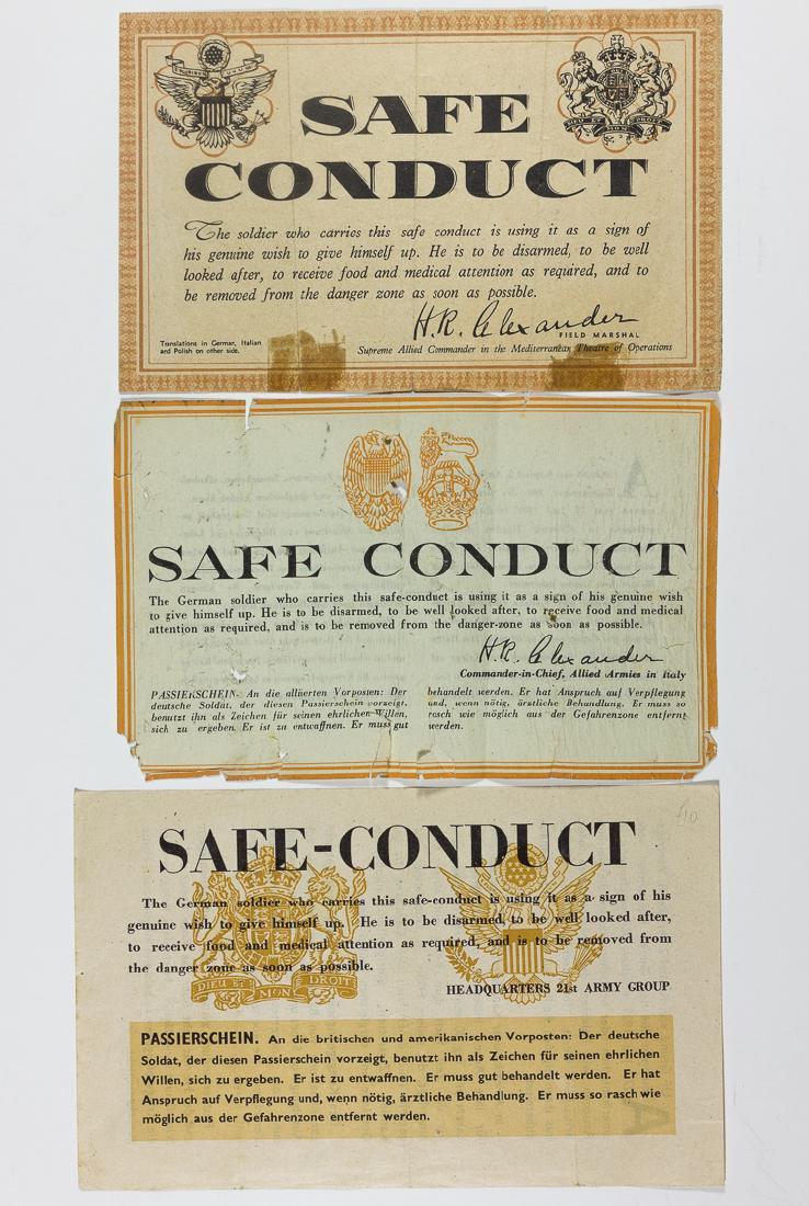 BRITISH-AMERICAN SAFE CONDUCT PASSES: BRITISH-AMERICAN SAFE CONDUCT PASSES Lot of three British-American "safe conduct" passes printed in German and English, one also with Italian text, two signed in print by Supreme Allied Commander (Med