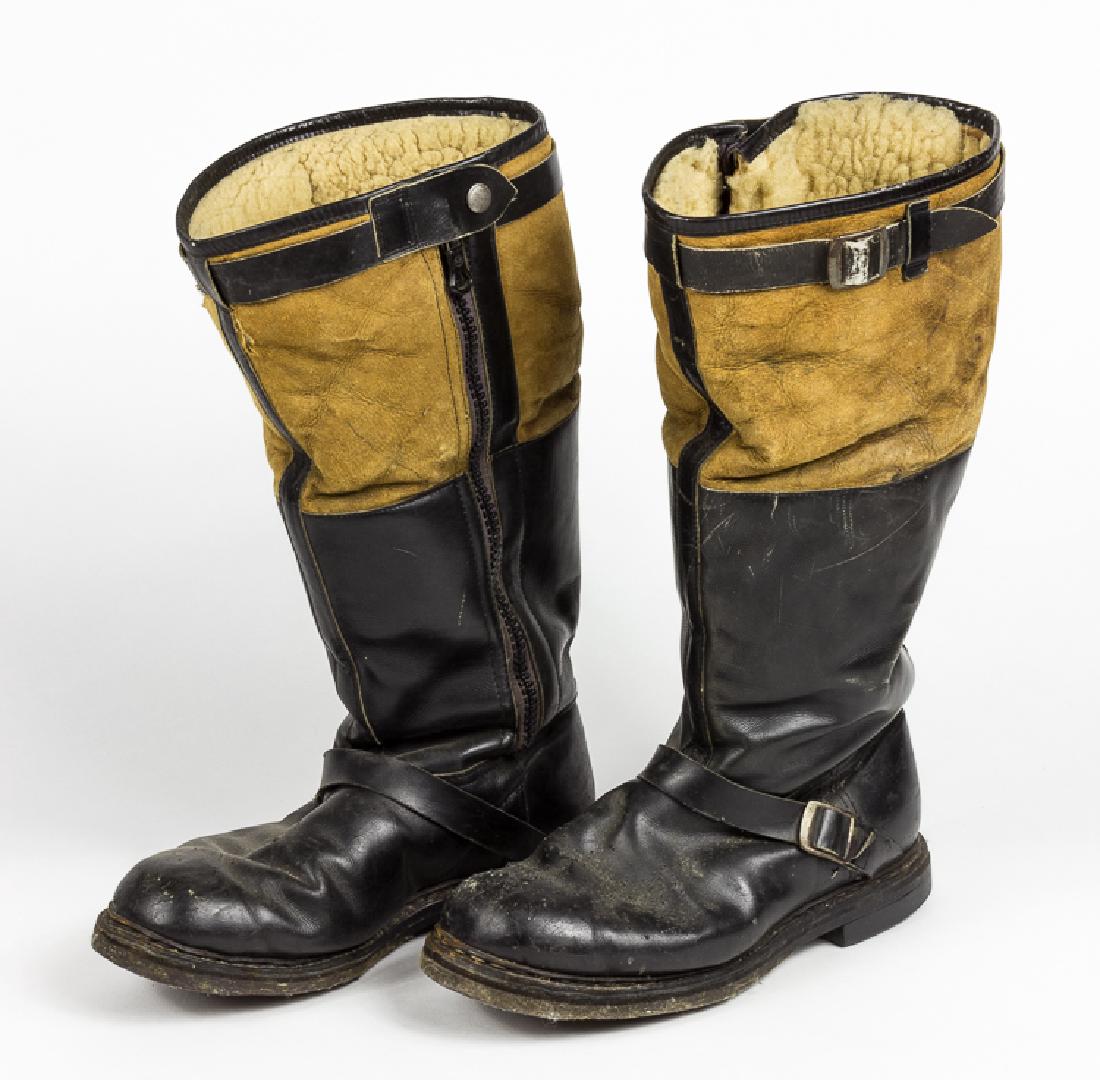 LUFTWAFFE FLYER'S BOOTS: LUFTWAFFE FLYER'S BOOTS Late war Luftwaffe fling boots, a matched pair unsized but sole length 12". Blacxk leather bottoms sewn to a more flexible sheepskin top, black leather strap reinforcements, wi