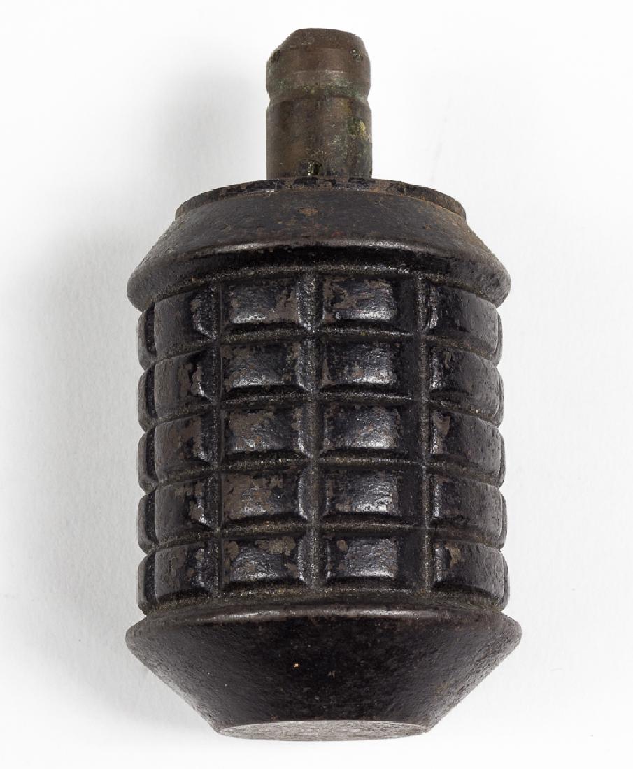 JAPANESE TYPE 97 HAND GRENADE: JAPANESE TYPE 97 HAND GRENADE Standard-issue Japanese Type 97 hand grenade, 3 3/4" x 2" dia., used by the Imperial Japanese Army and the Special Naval Landing Forces. The grenade features a cylindrica