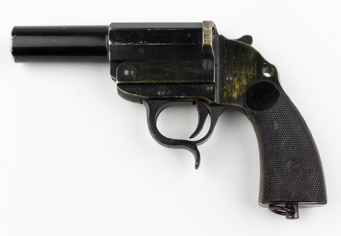 SINGLE BARRELED GERMAN FLARE GUN: SINGLE BARRELED GERMAN FLARE GUN German flare gun, a black "ayf 42" (Erma Factory, 1942) smooth barrel pistol with checkered Bakelite grips, the barrel further engraved with standard "Eagle 280" Waffe