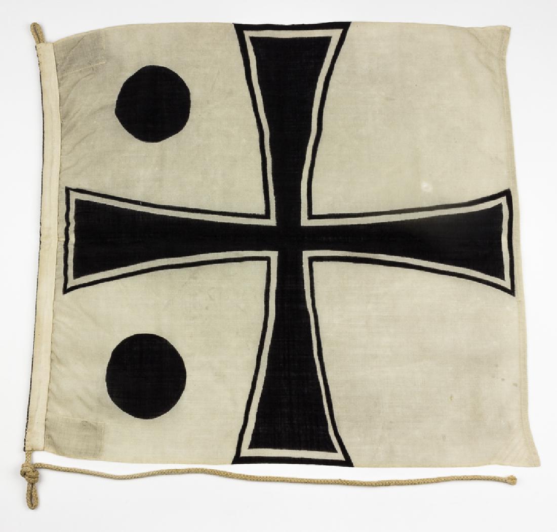 GERMAN REAR ADMIRAL'S FLAG: GERMAN REAR ADMIRAL'S FLAG World War I Imperial German Rear Admiral's flag, 24" x 22 1/2" wool, an Iron Cross with two black circles at left denoting rank. The four corners of the flah are reinforced 