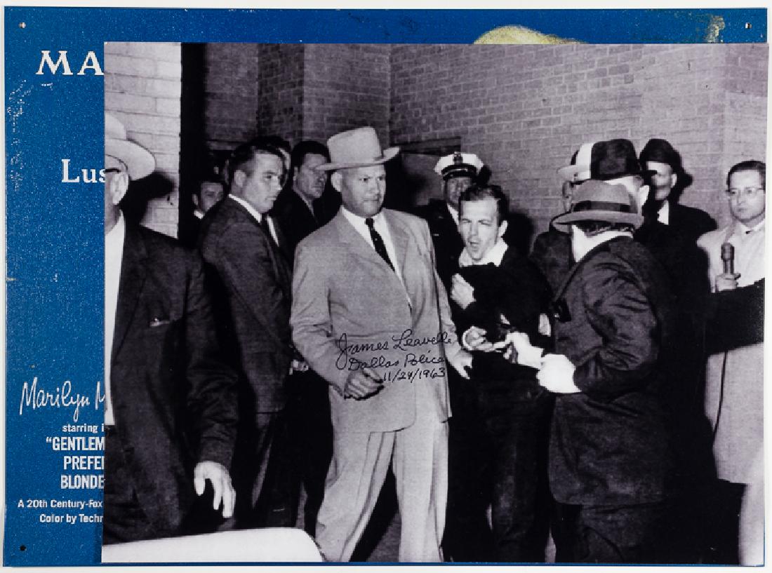 (LEE HARVEY OSWALD) JAMES LEAVELLE: (LEE HARVEY OSWALD) JAMES LEAVELLE (b. 1920) Dallas homicide detective who was escorting Lee Harvey Oswald through the basement of Dallas Police headquarters when Oswald was shot by Jack Ruby. S.P. 11