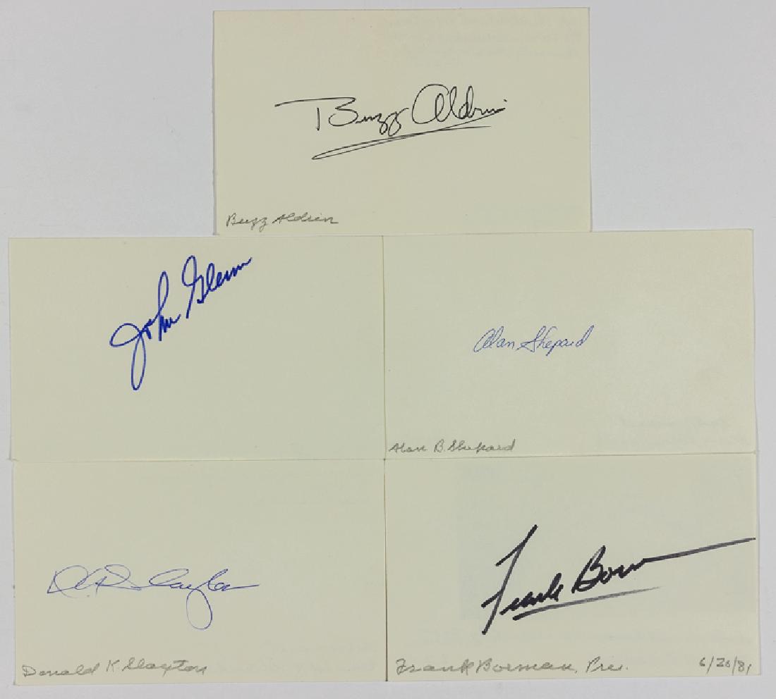 ASTRONAUTS: ASTRONAUTS Lot of five signatures on white cards, includes: BUZZ ALDRIN, JOHN GLENN, ALAN SHEPARD, DONALD K. SLAYTON and FRANK BORMAN. Fine.